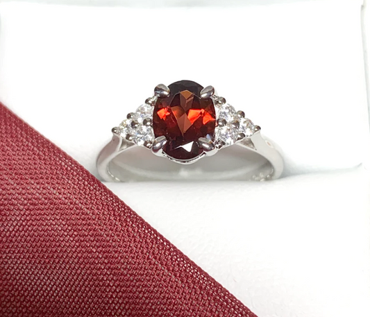 Garnet dress ring set in sterling silver