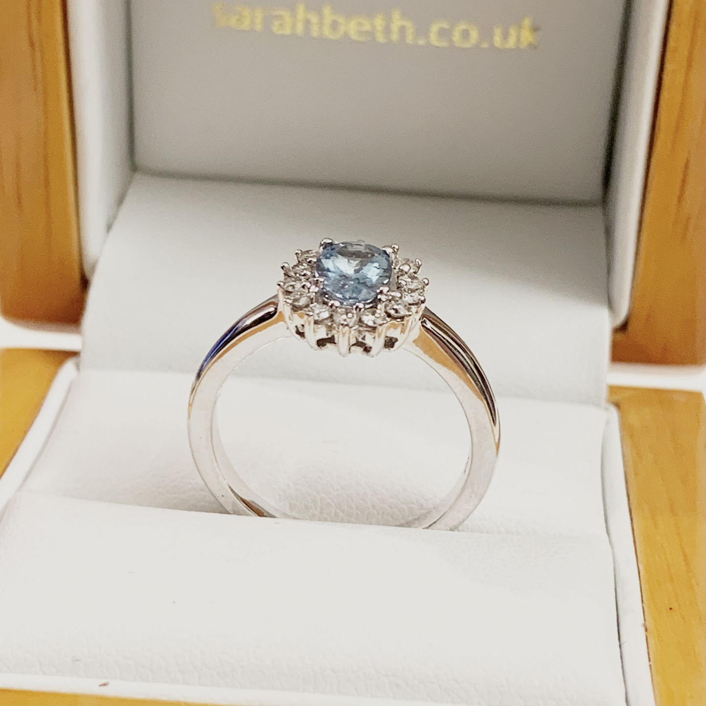 1.11 Carat Aquamarine white gold oval and diamond cluster ring