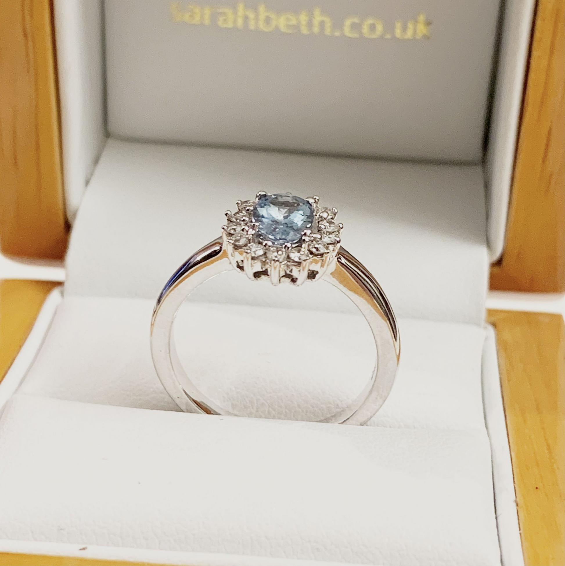 1.11 Carat Aquamarine white gold oval and diamond cluster ring