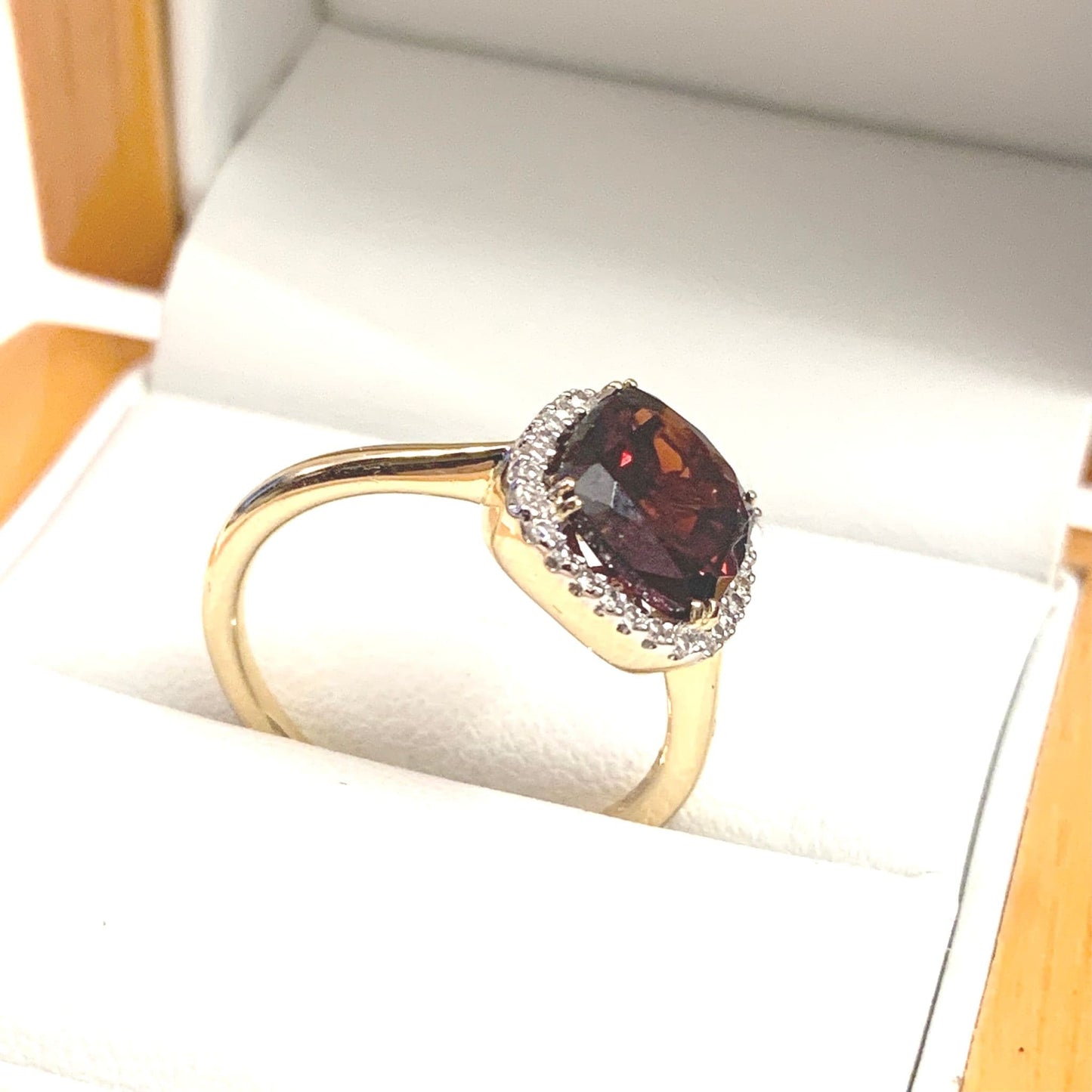 2.8 carat Garnet Cushion Shaped 18 Carat Yellow Gold Garnet And Diamond Cluster Ring