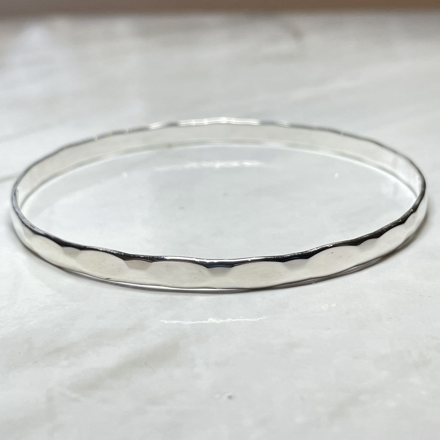 Round faceted plain sterling silver polished slave bangle