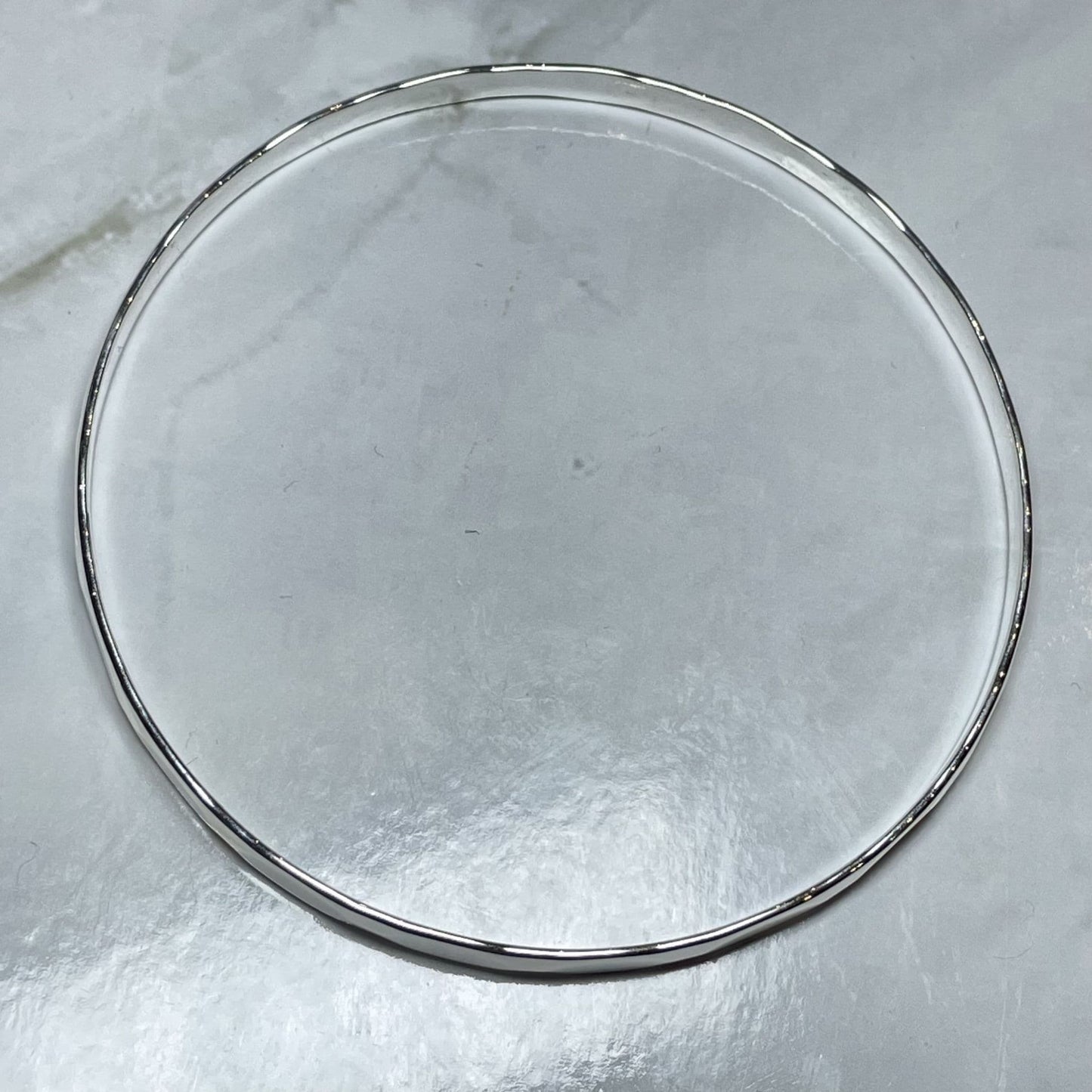 Round faceted plain sterling silver polished slave bangle