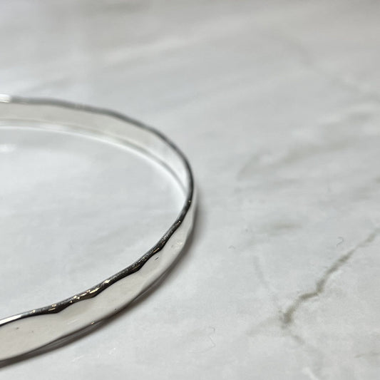 Round faceted plain sterling silver polished slave bangle