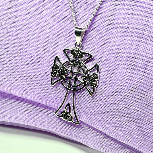 A Large Fancy Patterned Sterling Silver Celtic Cross Including Chain