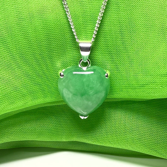 A beautiful and stunning real green jade necklace heart shaped sterling silver pendant