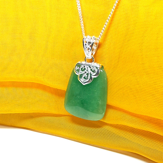 A beautiful and stunning real green jade necklace large pendant that is cushion in shape