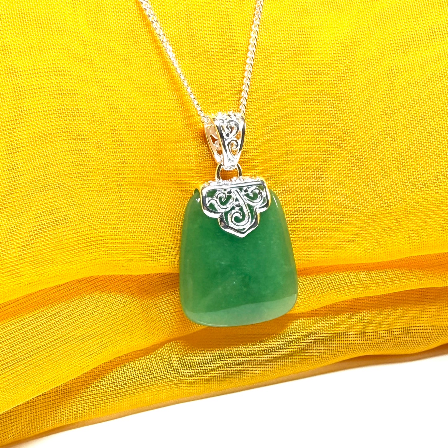 A beautiful and stunning real green jade necklace large pendant that is cushion in shape