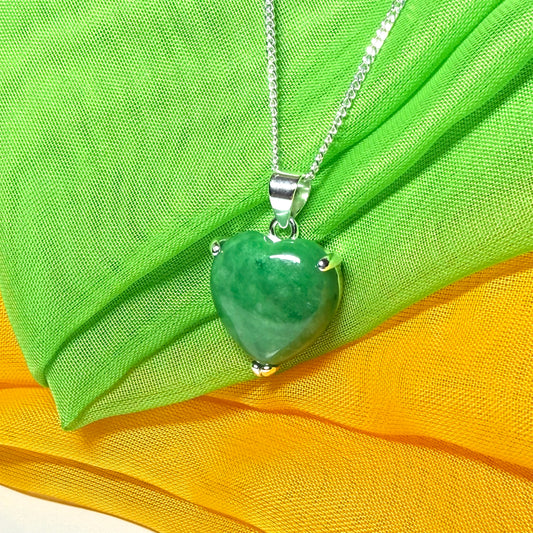 A beautiful real green jade necklace heart shape sterling silver pendant