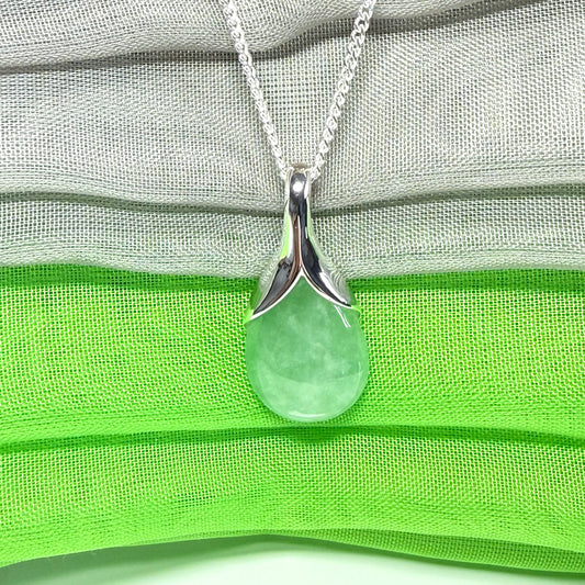 A beautiful real green jade necklace in a teardrop or pear shape, a gorgeous designed pendant
