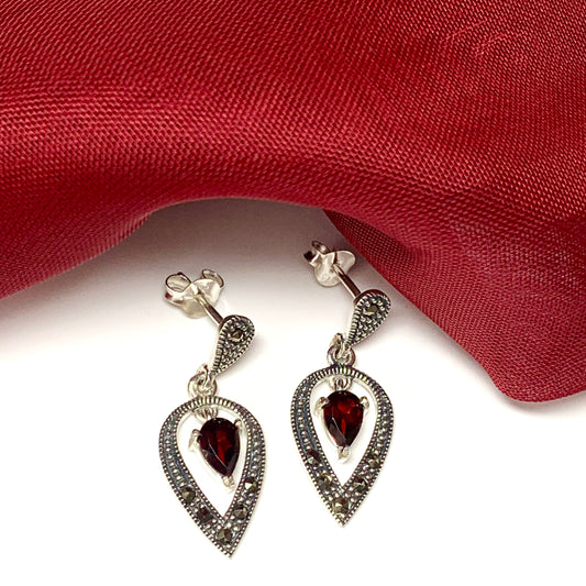 A gorgeous pair of drop earrings with real garnet stones and real marcasite stones