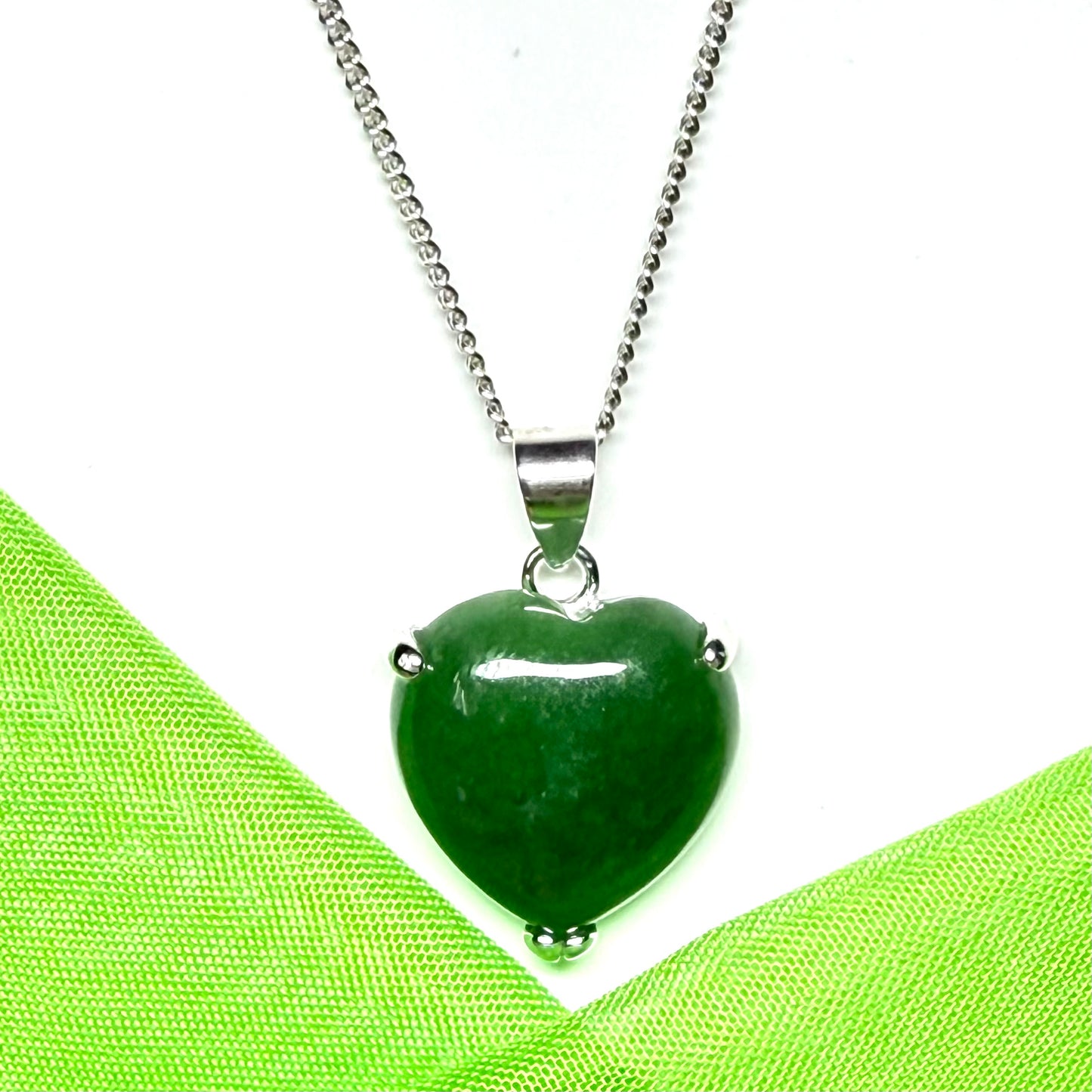 A real dark green jade necklace heart shape sterling silver pendant
