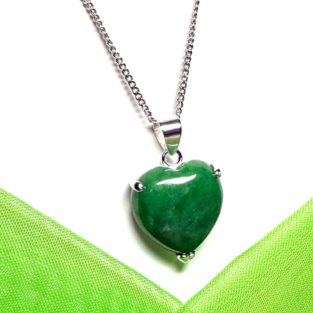 A real dark green jade pendant necklace heart shaped sterling silver setting, simply beautiful