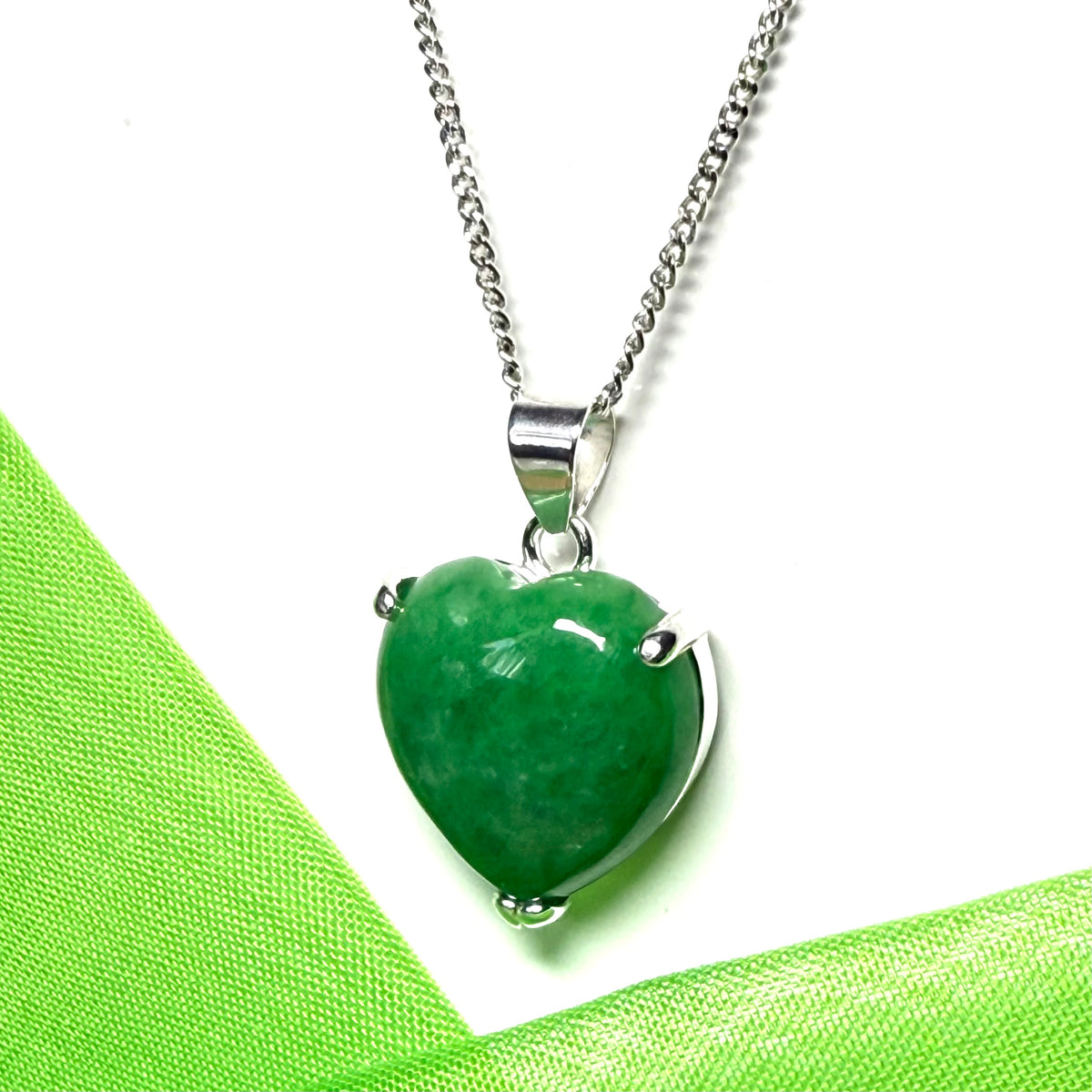 A real dark green jade pendant necklace heart shaped sterling silver setting, simply beautiful