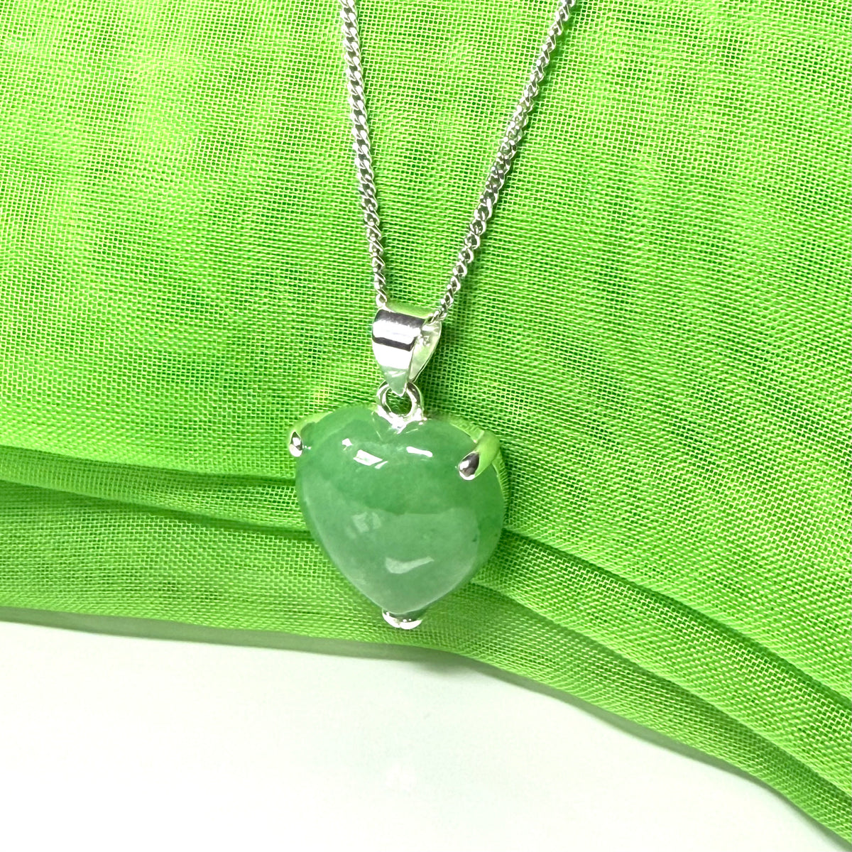 A real green jade necklace heart shape sterling silver, a timeless exquisite pendant