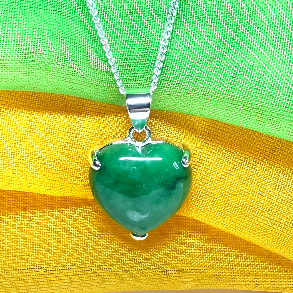 A real green jade necklace heart shaped sterling silver, an exquisite designed pendant
