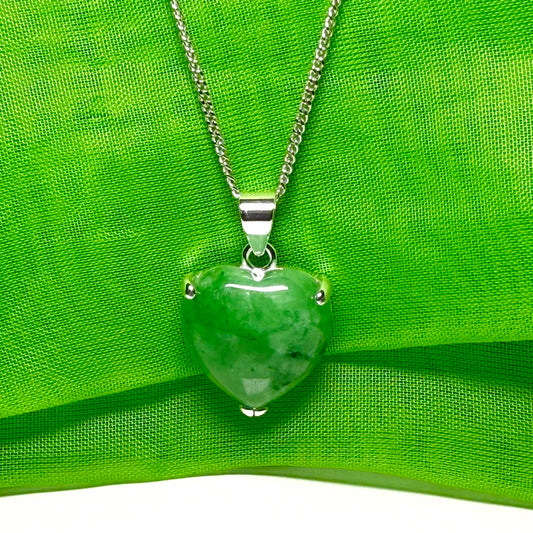 A real green jade necklace heart shaped sterling silver love pendant