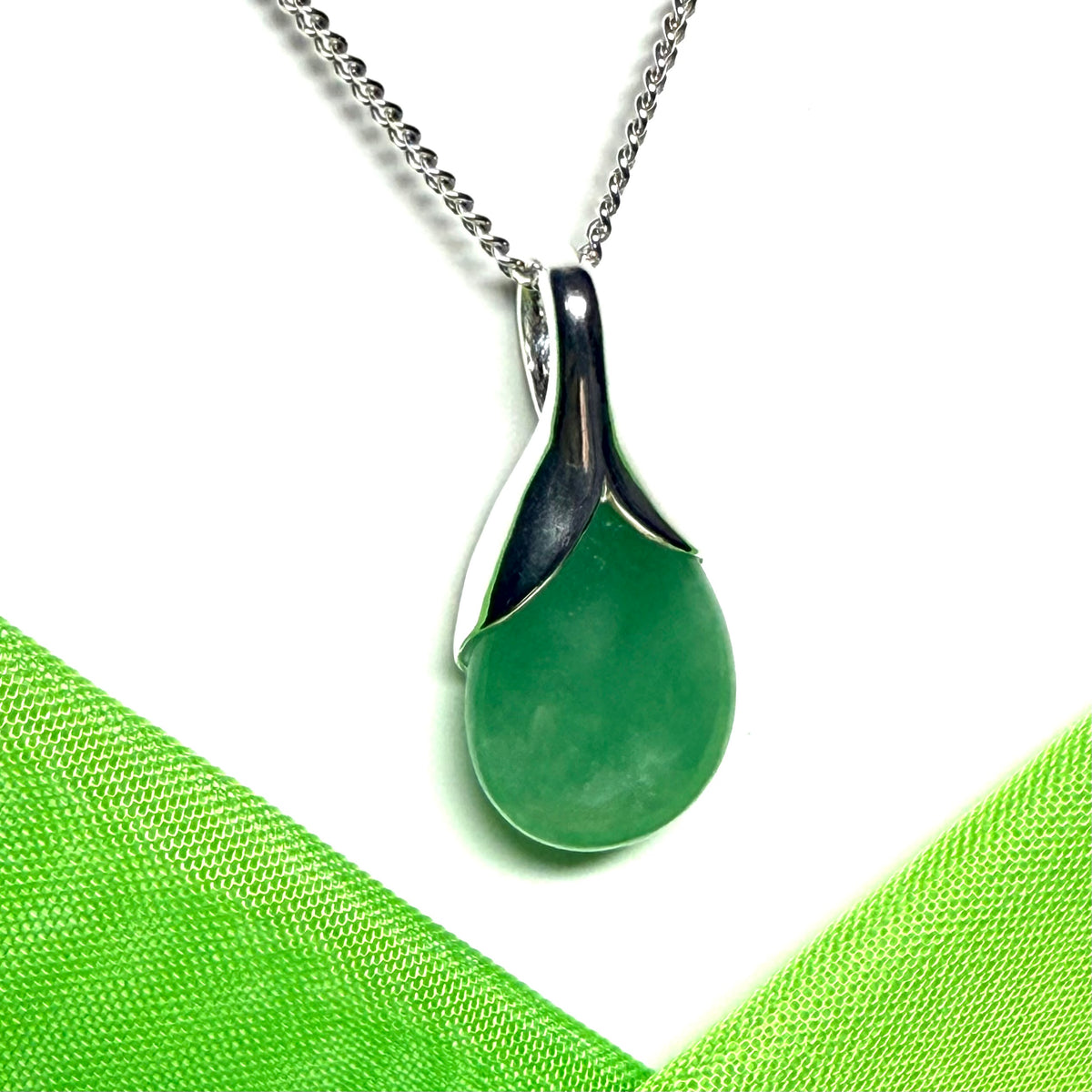 A real green jade necklace in a teardrop or pear shaped including chain and gift box