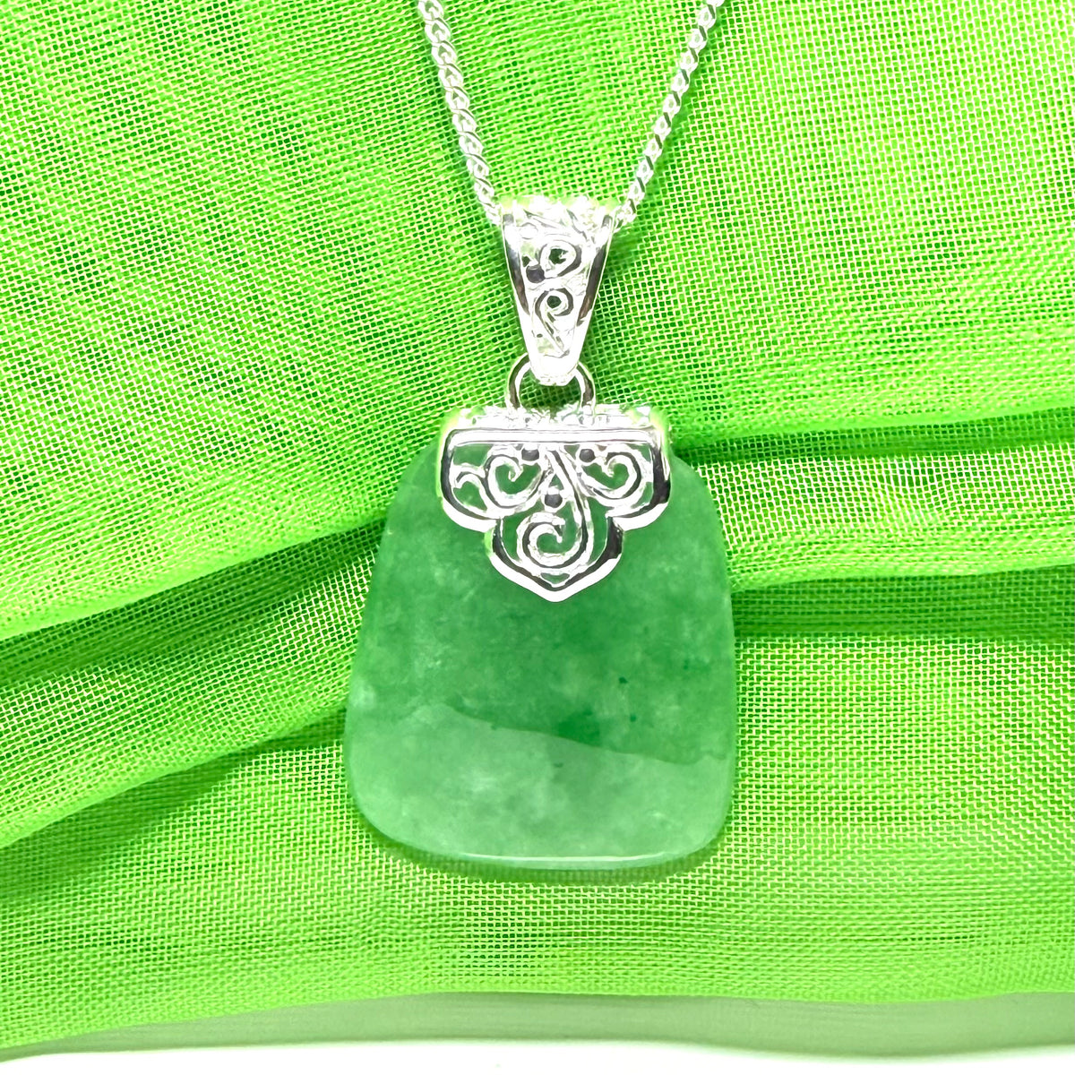 A real green jade necklace silver large cushion shaped, a truly gorgeous pendant