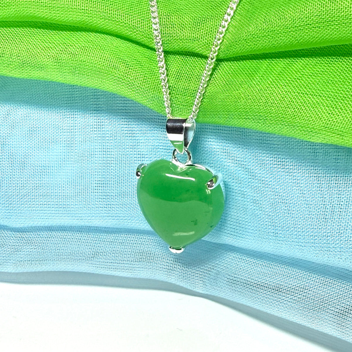 A real green jade pendant heart shaped sterling silver, a stunning design necklace