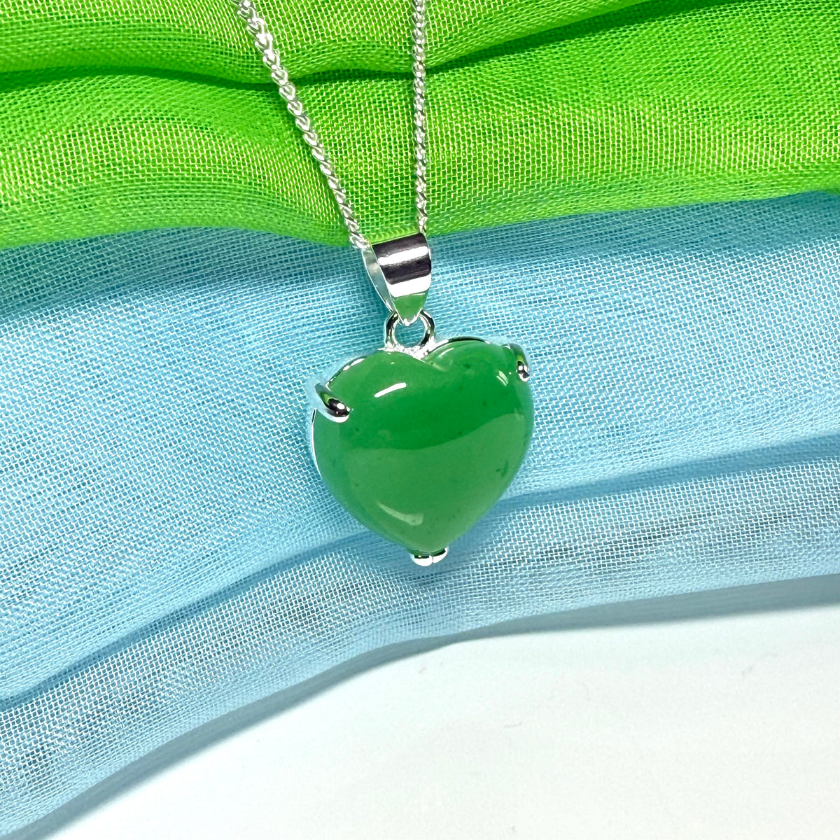 A real green jade pendant heart shaped sterling silver, a stunning design necklace