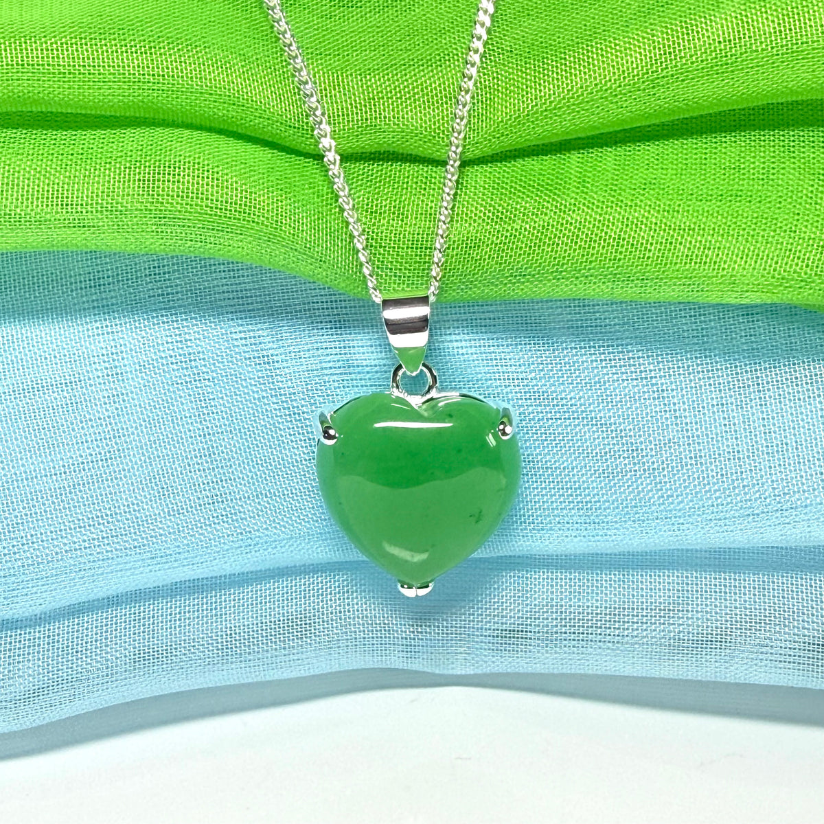 A real green jade pendant heart shaped sterling silver, a stunning design necklace