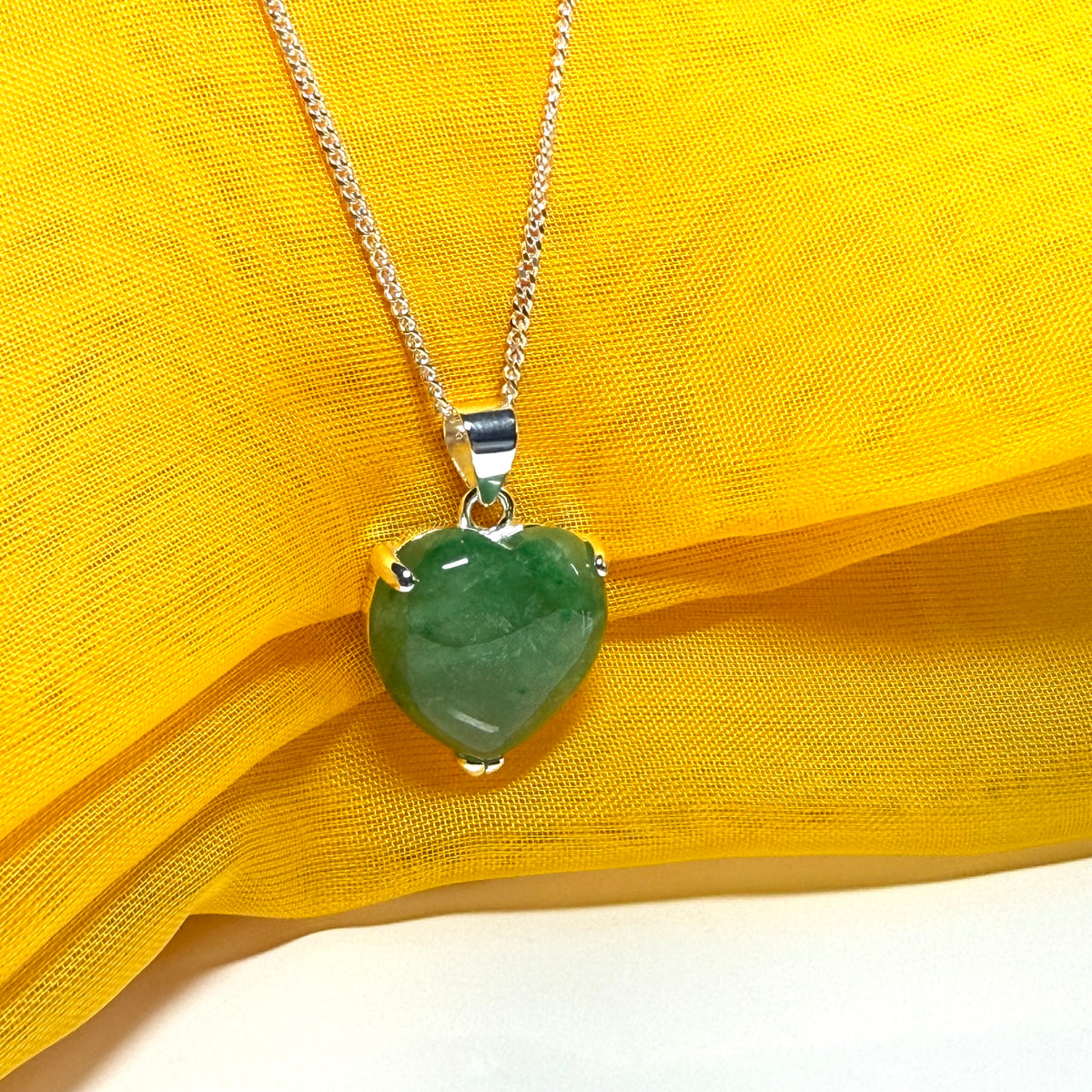 A real green jade pendant heart shaped sterling silver, an exquisite designed necklace