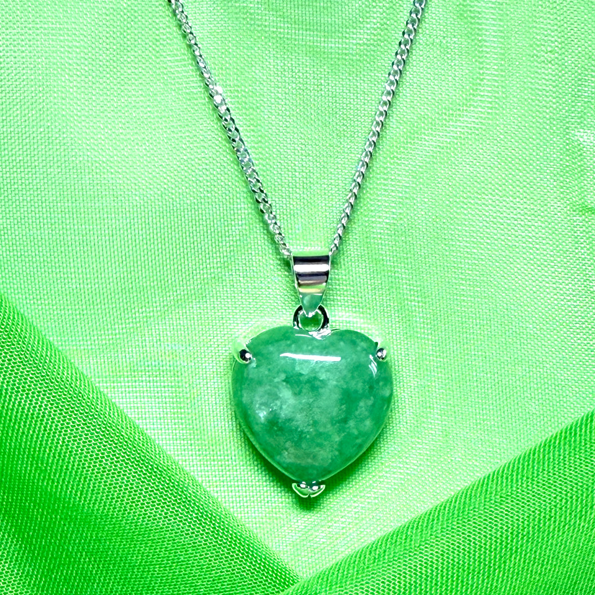 A_real_green_jade_pendant_heart_shaped_sterling_silver_an_eye_opening_design_necklace