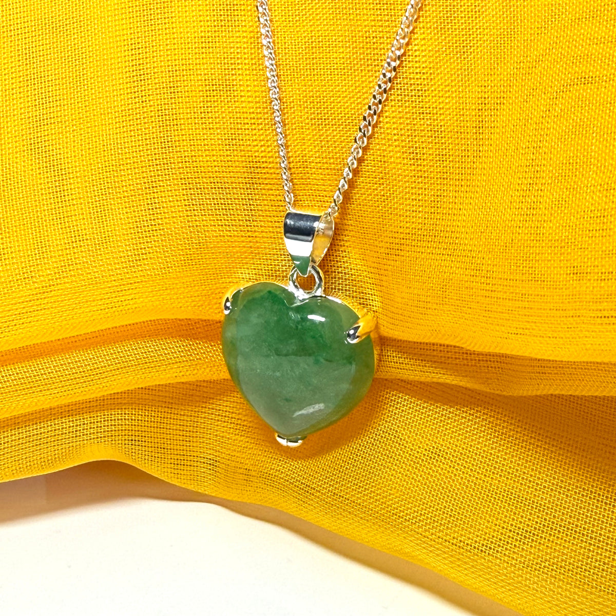 A real green jade pendant heart shaped sterling silver, an exquisite designed necklace