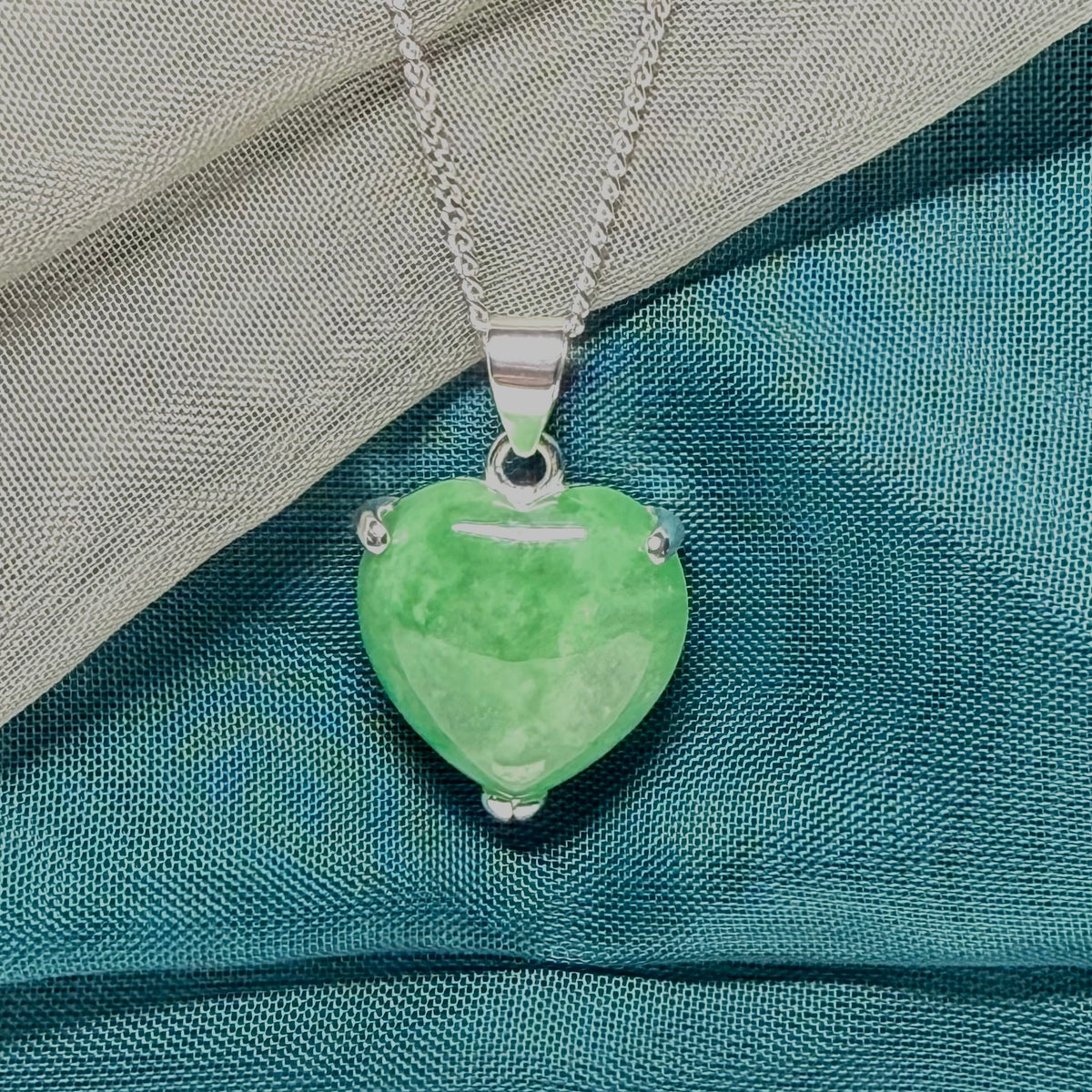 A real green jade pendant necklace heart shape sterling silver and chain