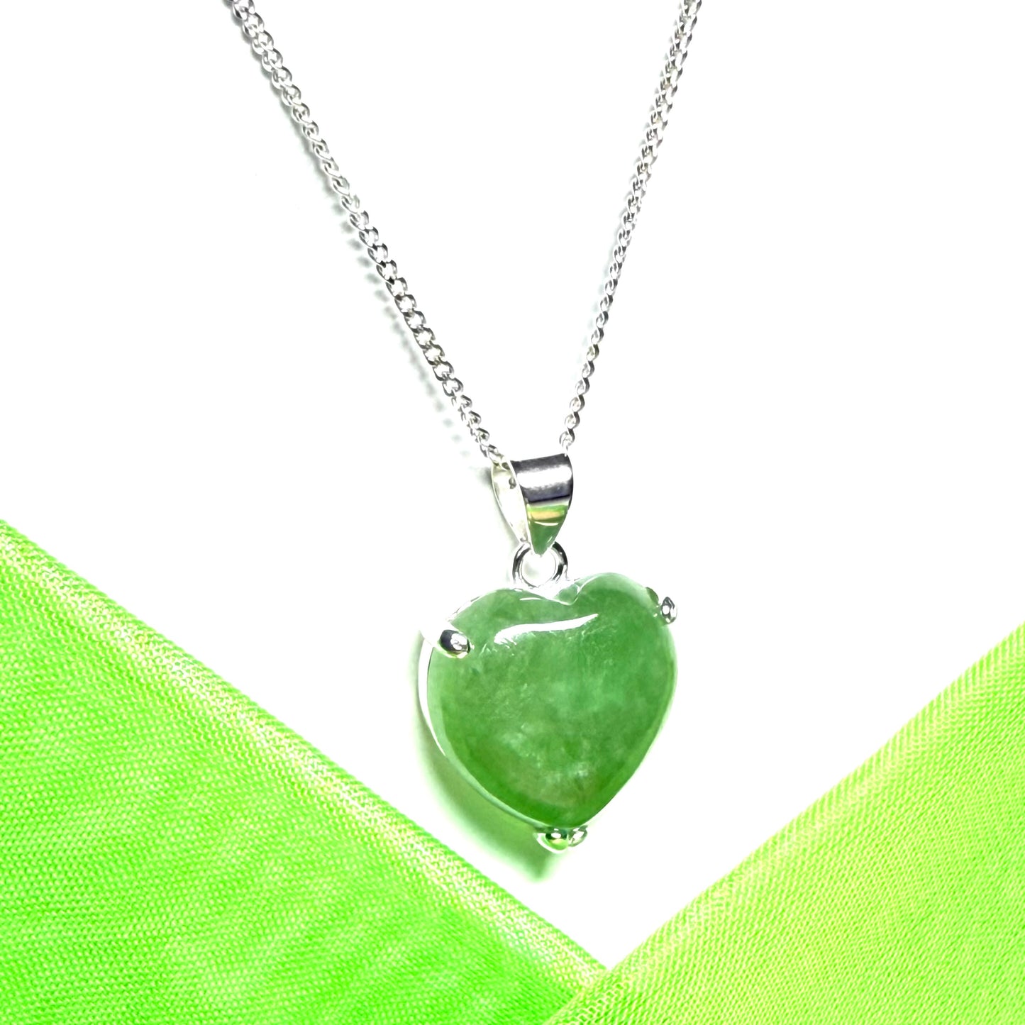 A real green jade pendant necklace heart shape sterling silver with chain