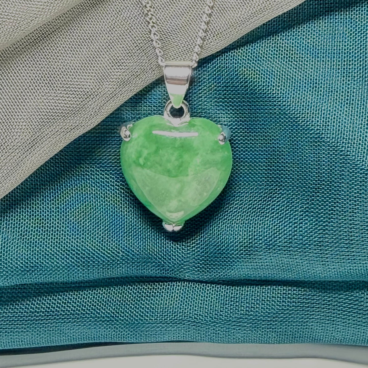 A real green jade pendant necklace heart shape sterling silver and chain