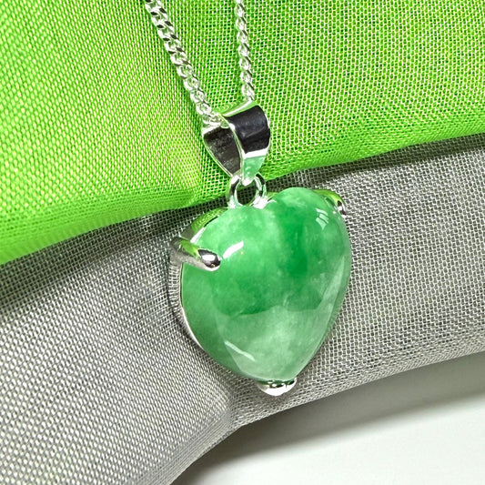 A really stunning pendant with a real green jade necklace heart shaped sterling silver