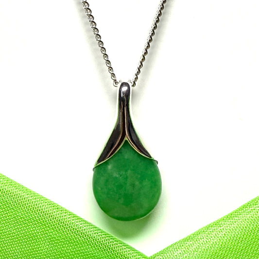A stunning real green jade necklace in a teardrop or a pear shape including a solid chain