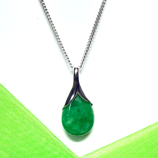 A beautiful real green jade necklace with a teardrop pendant pear shape solid curb chain included