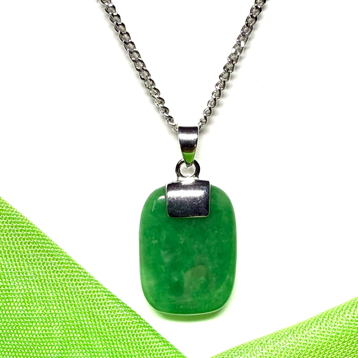 A stunning sterling silver cushion shaped real green jade necklace pendant with a solid curb chain included