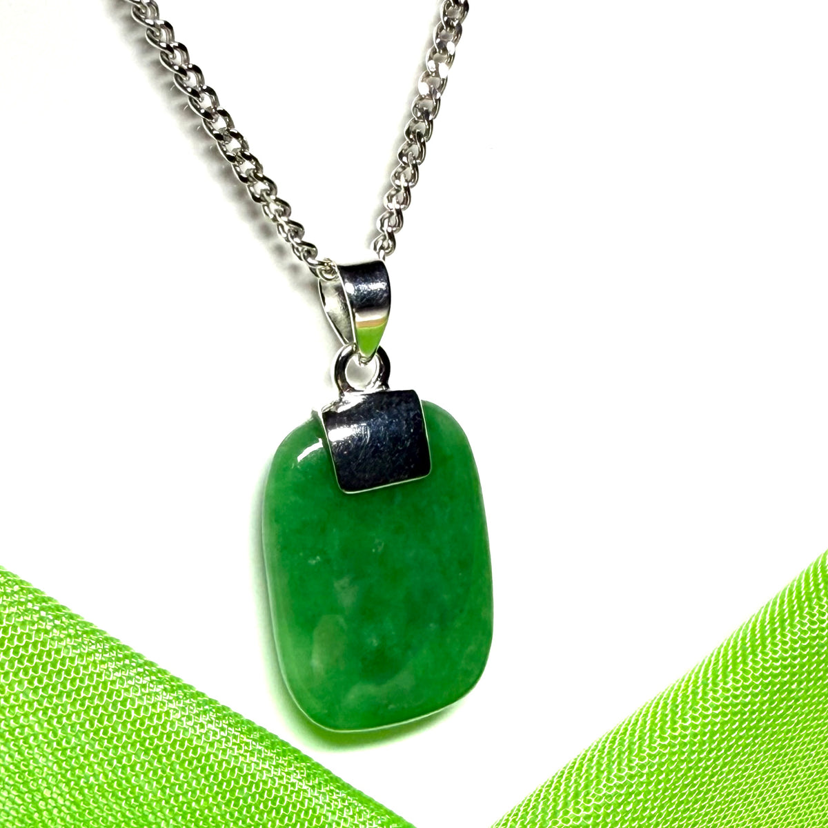 A stunning sterling silver cushion shaped real green jade necklace pendant with a solid curb chain included