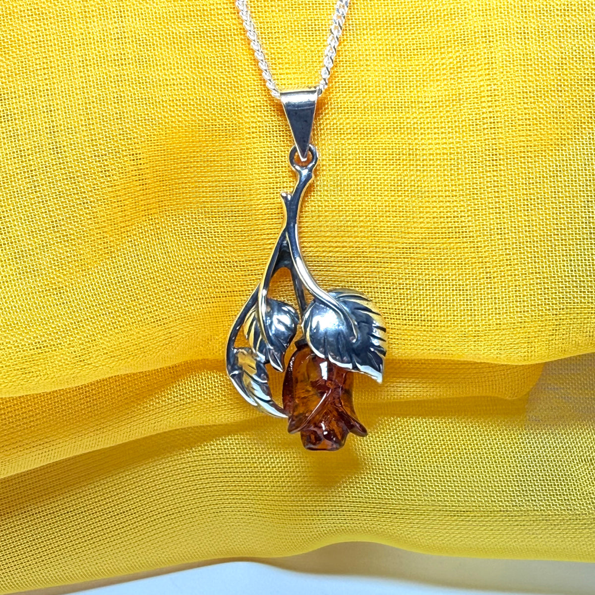 Amber rose shaped necklace sterling silver