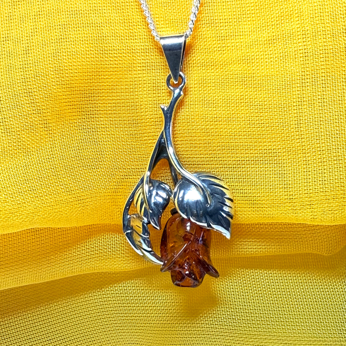 Amber rose shaped necklace sterling silver