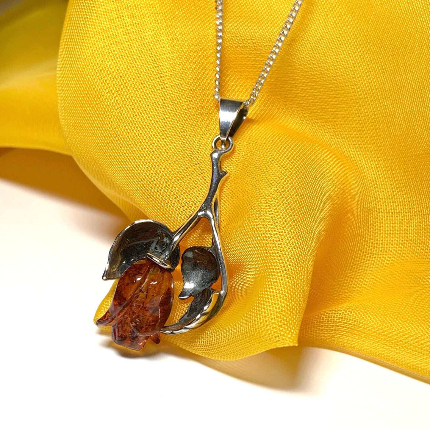 Amber rose shaped necklace sterling silver