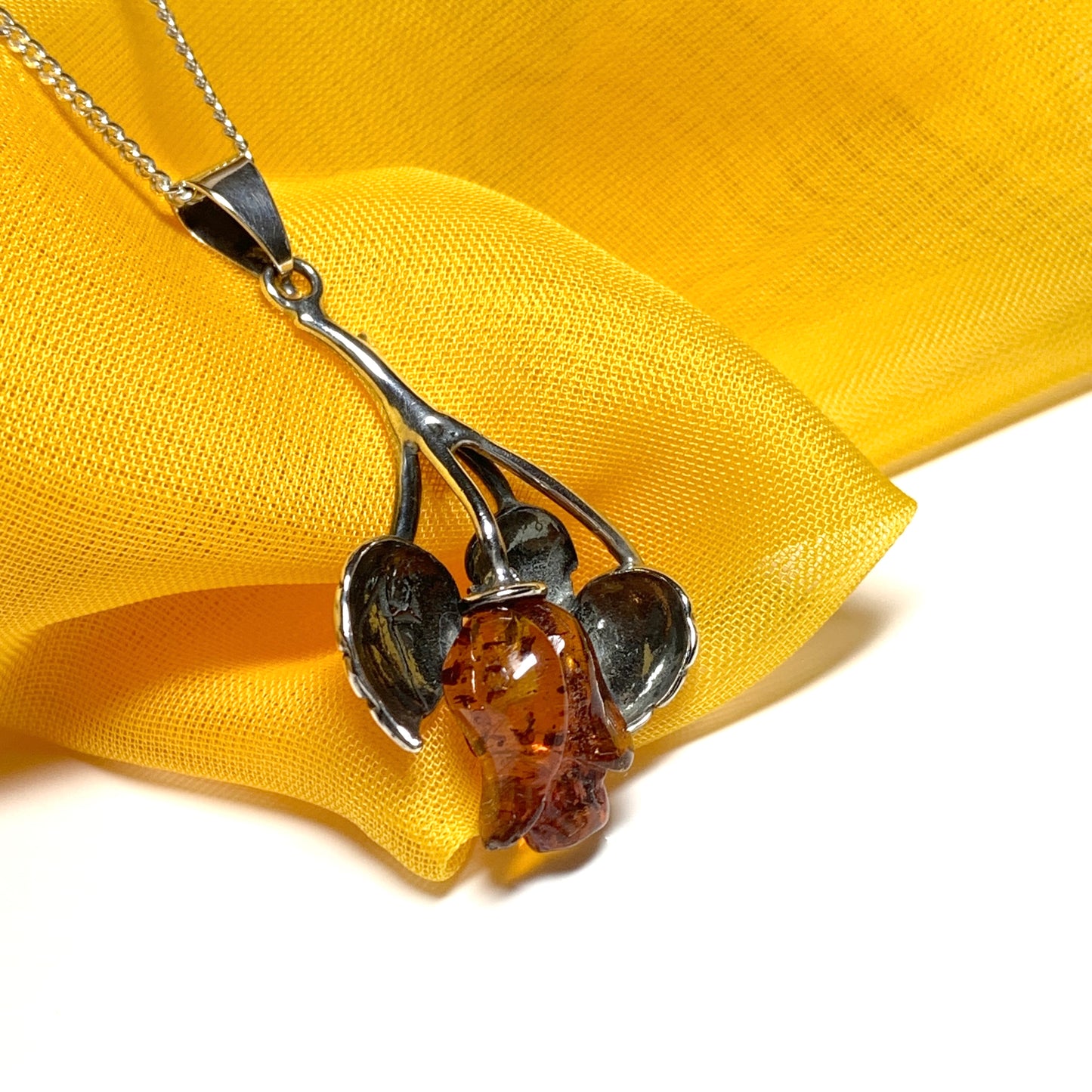 Amber rose shaped necklace sterling silver