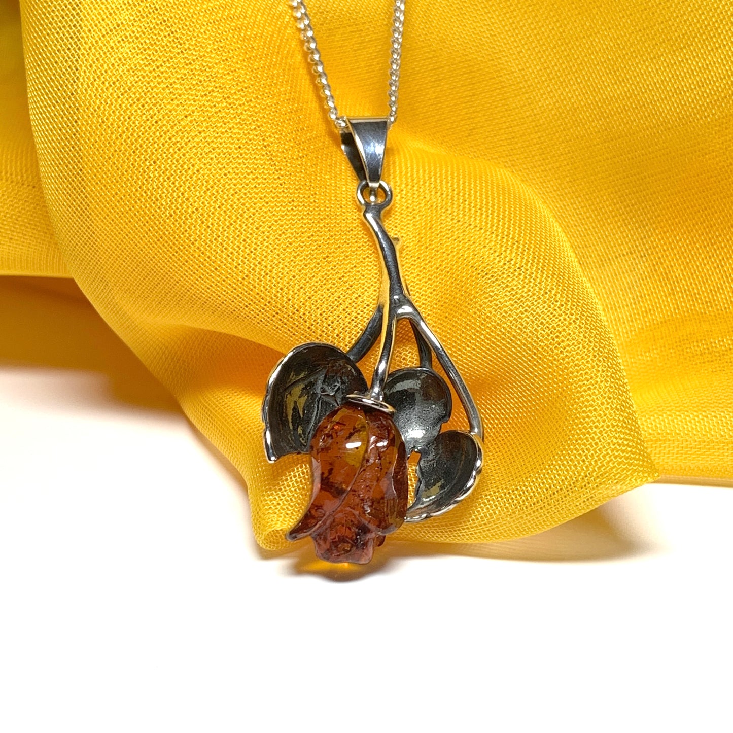 Amber rose shaped necklace sterling silver