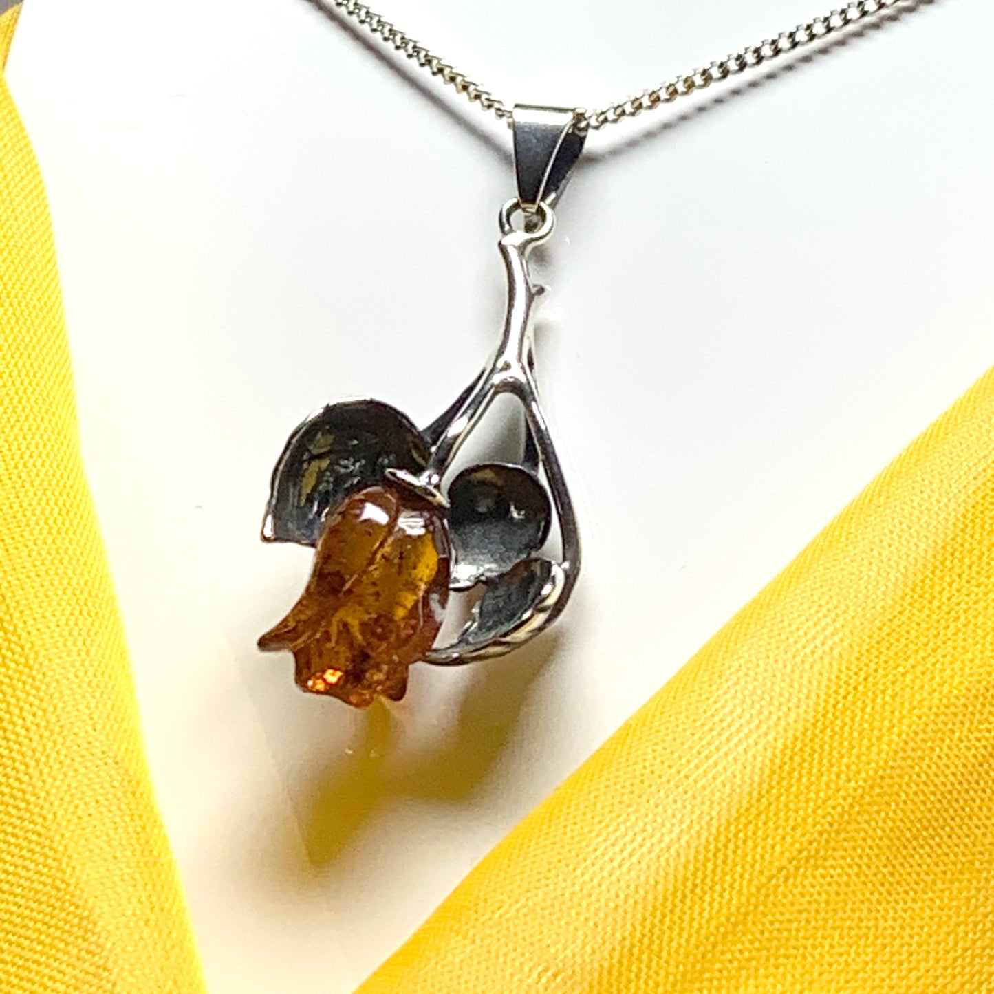 Amber rose shaped necklace sterling silver