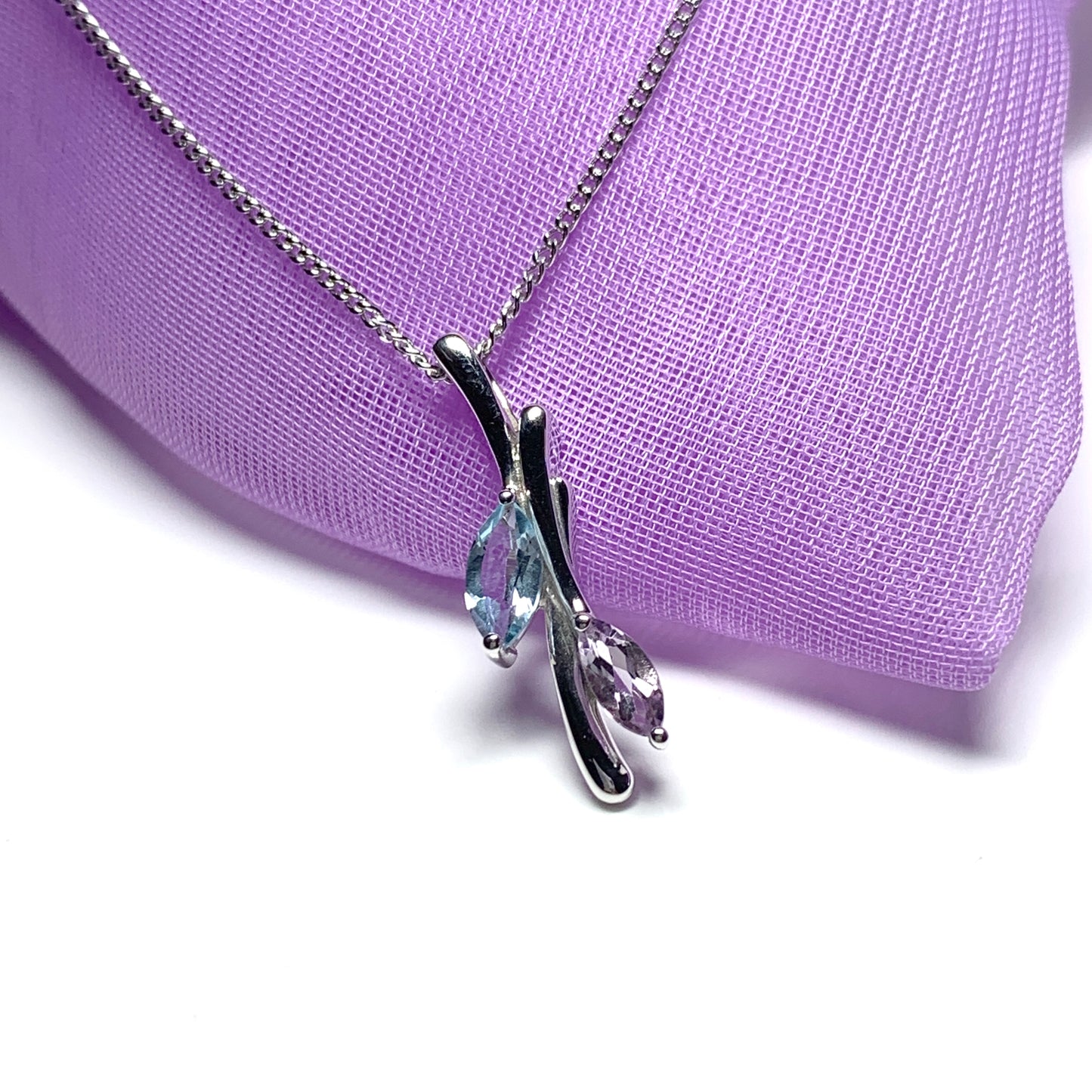 Amethyst and blue topaz swirl necklace pendant