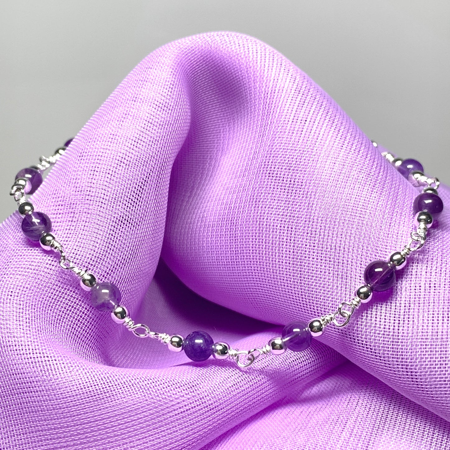 Amethyst round sterling silver bracelet