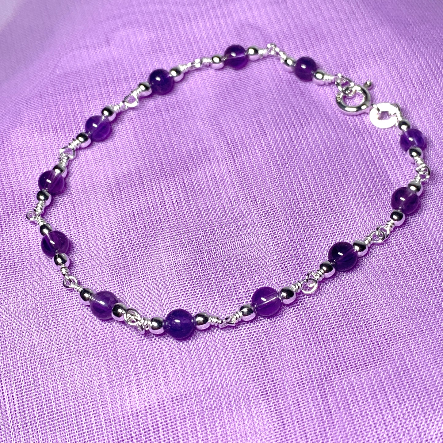 Amethyst round sterling silver bracelet