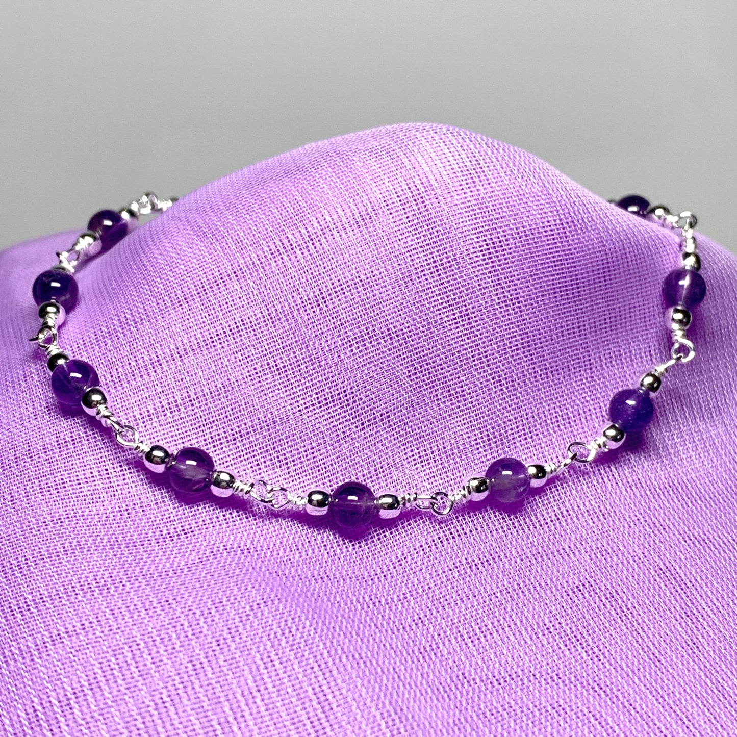 Amethyst round sterling silver bracelet