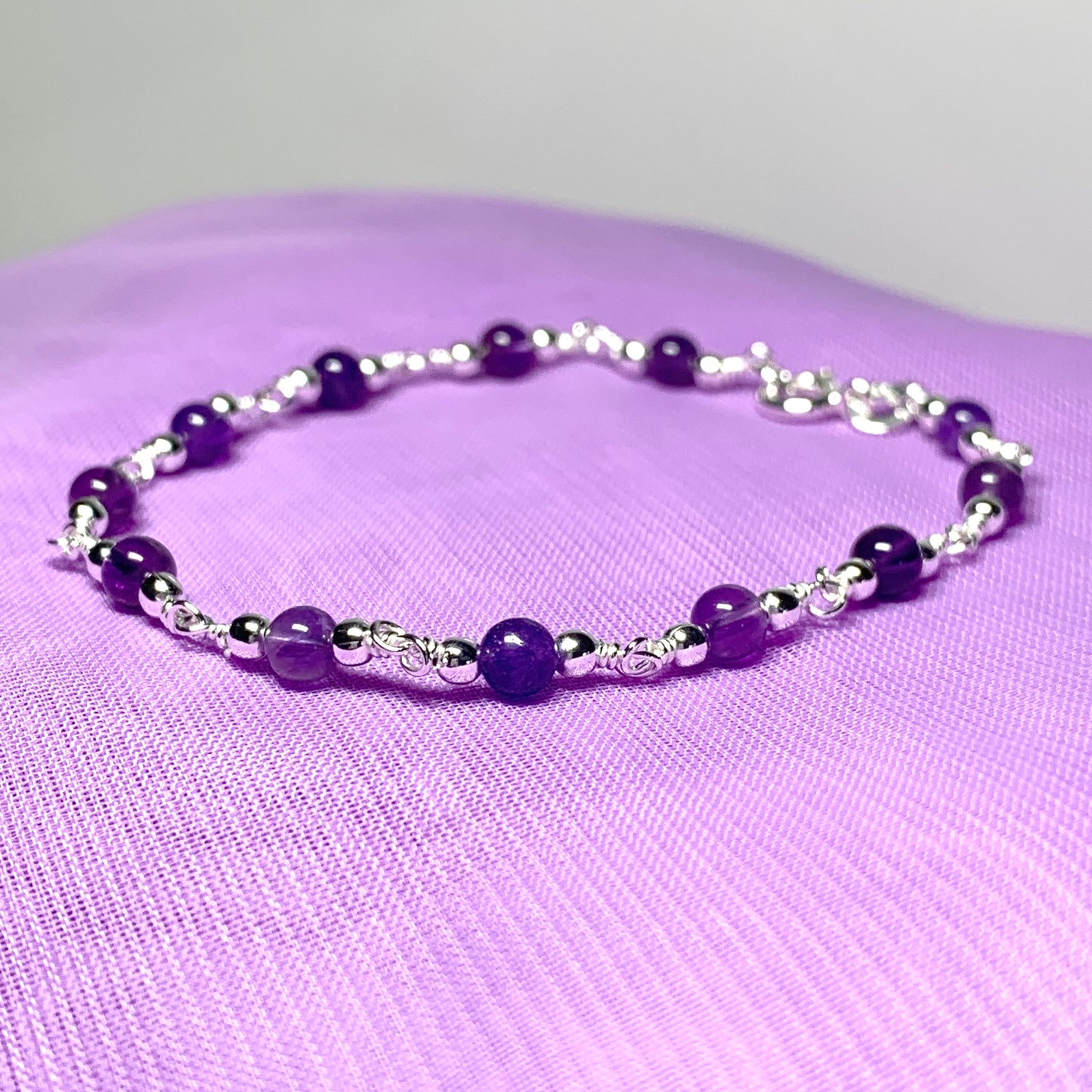 Amethyst round sterling silver bracelet