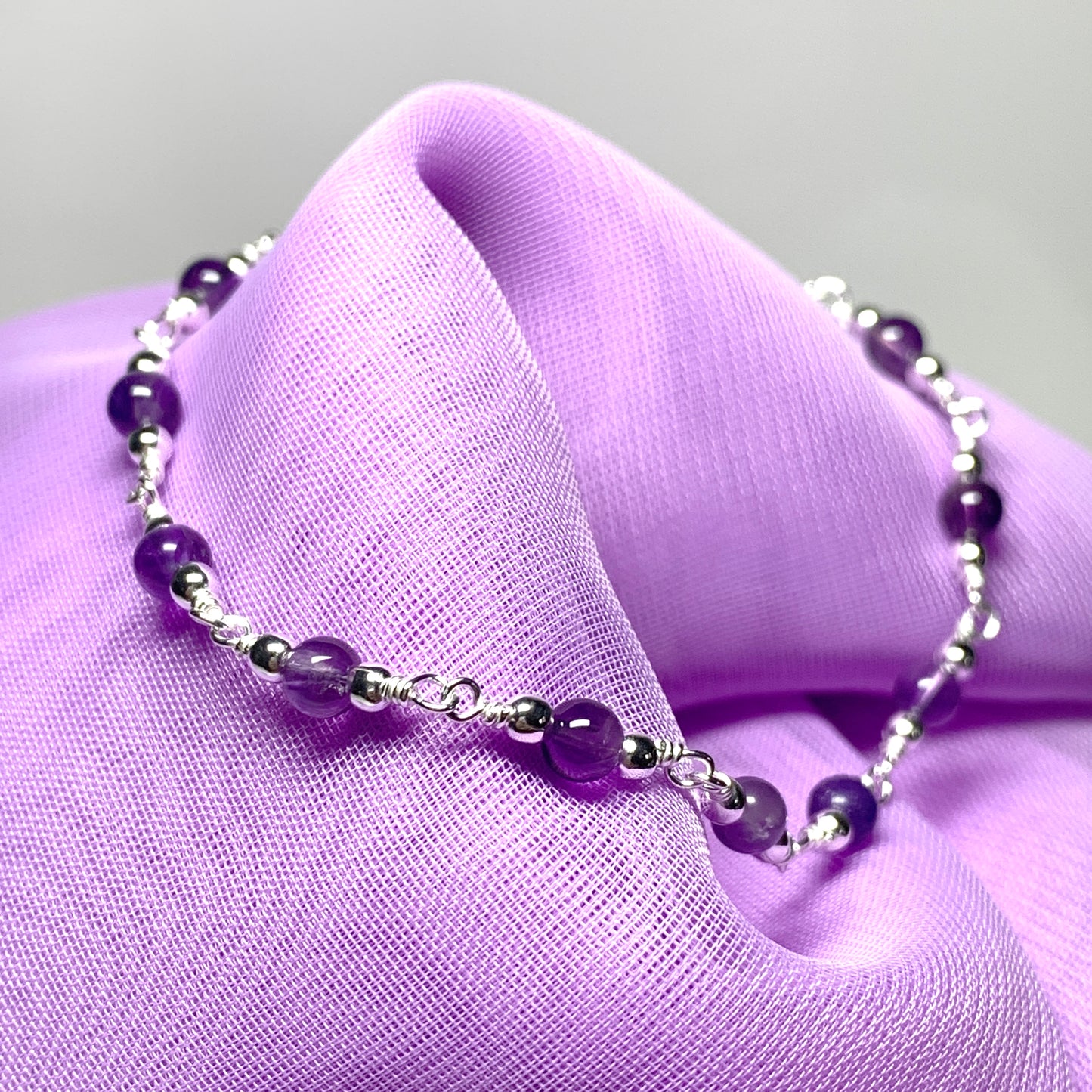 Amethyst round sterling silver bracelet