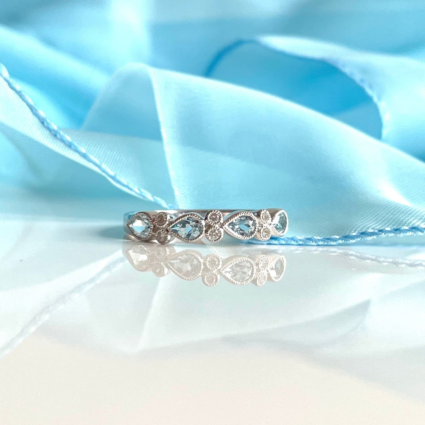 Real aquamarine eternity ring and diamond white gold fancy