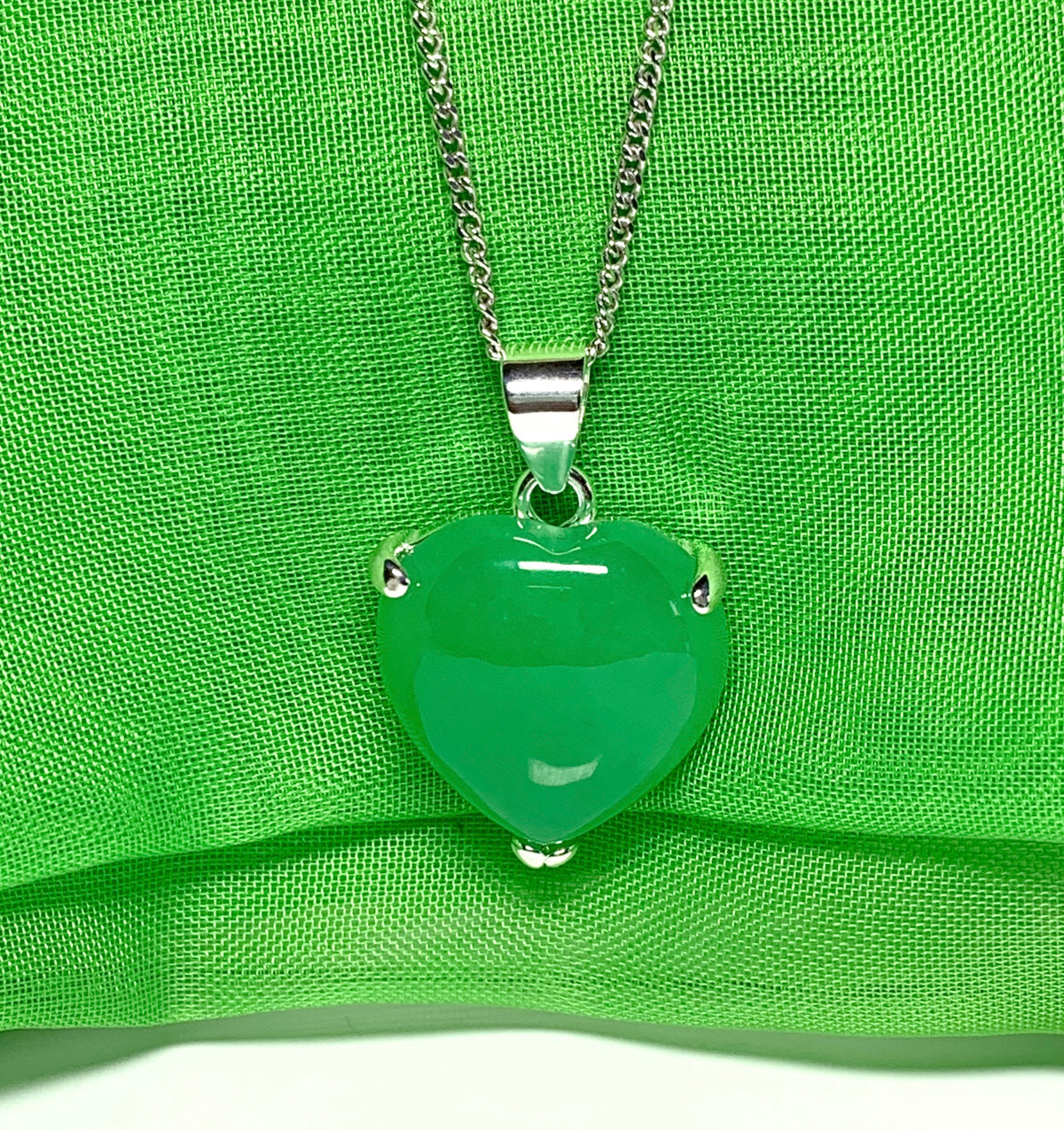 A real green jade necklace heart shaped sterling silver gorgeous pendant